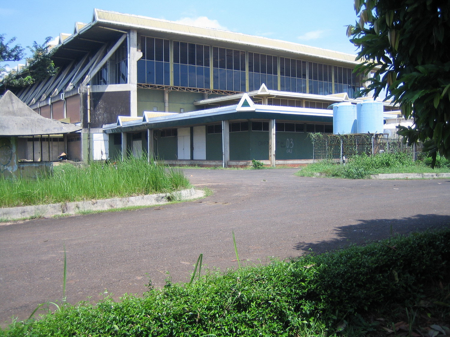 A research building set within a mature landscape